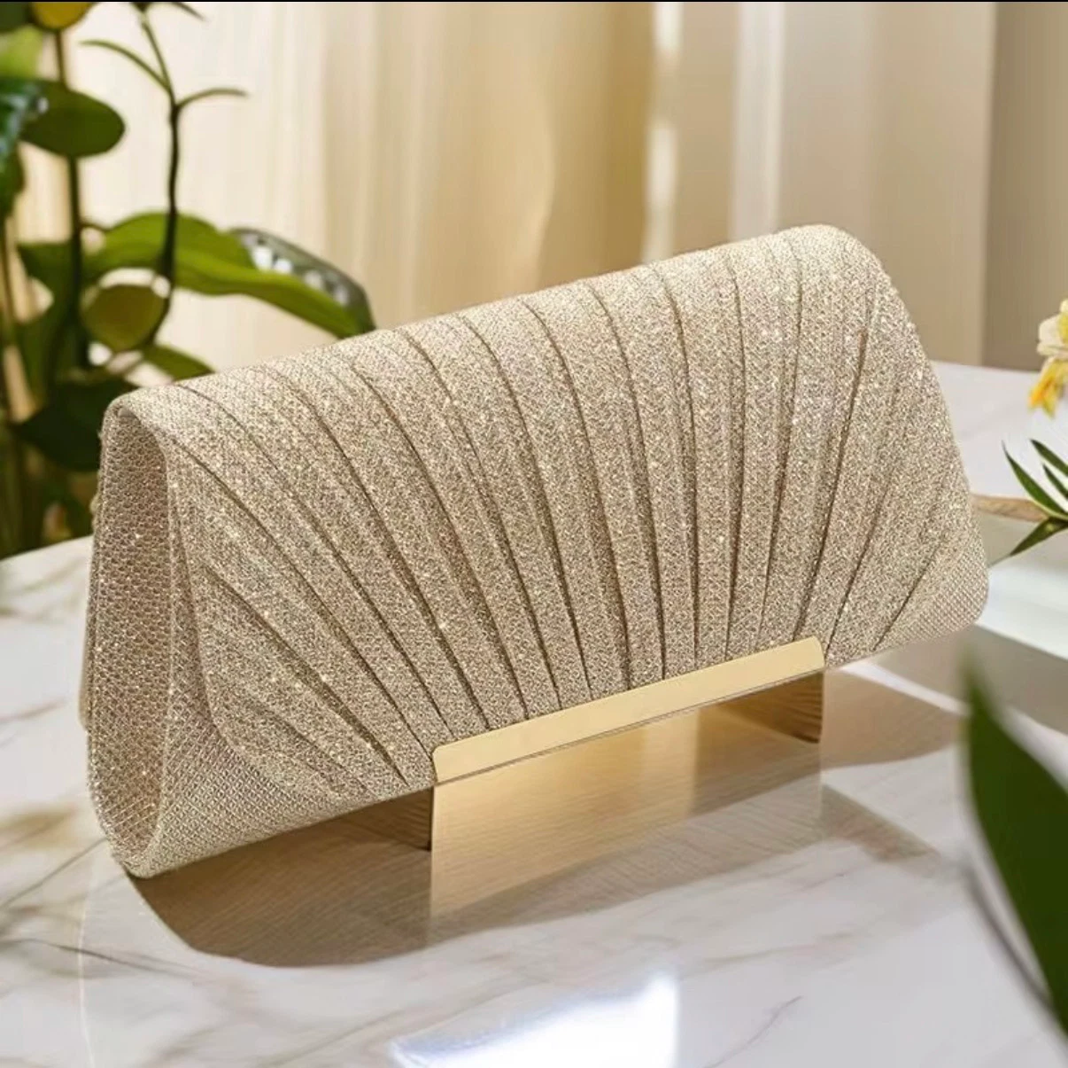Celeste Shimmer Clutch - Dim Gold